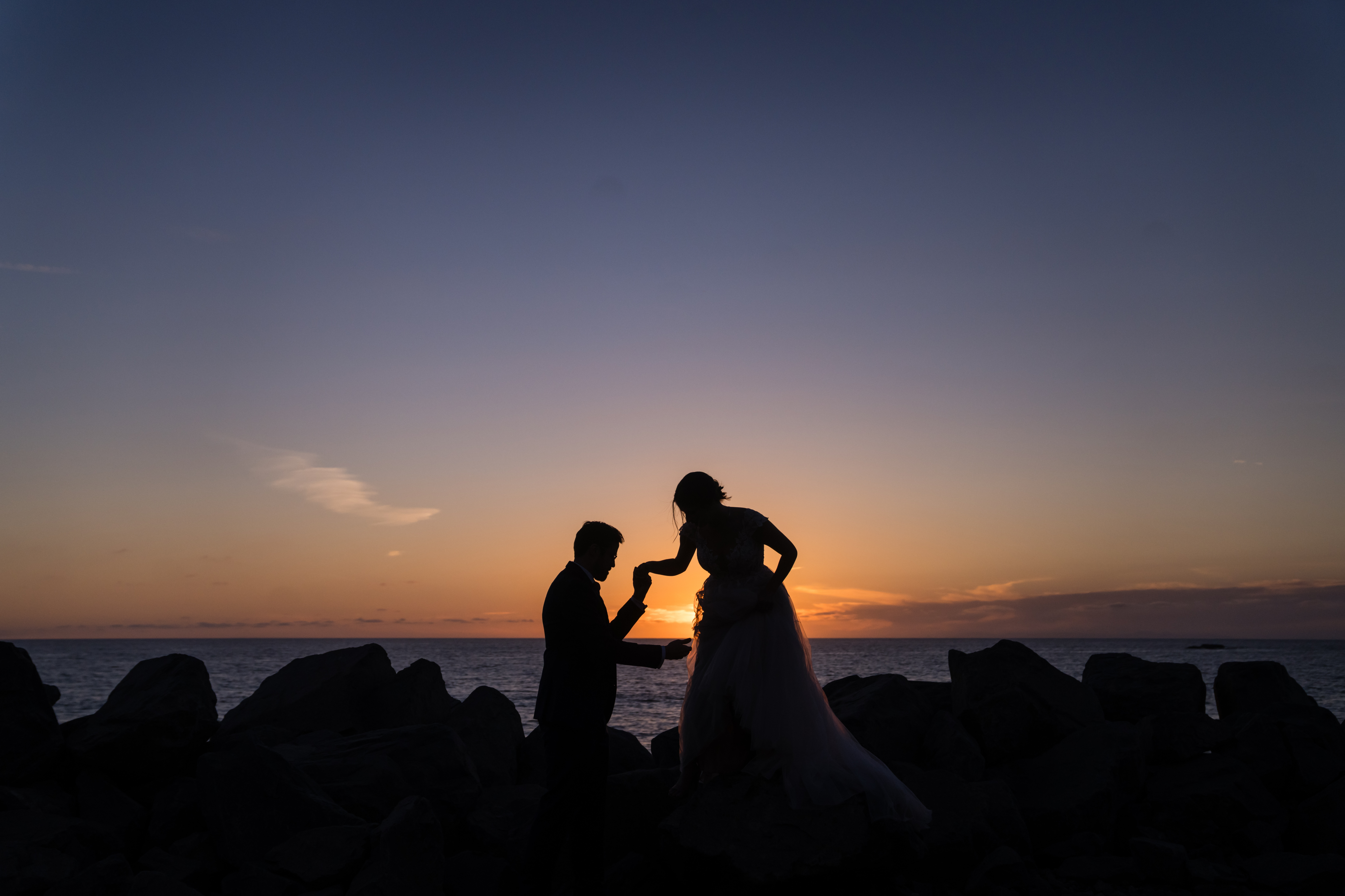 Joyful couple at intimate coastal California wedding