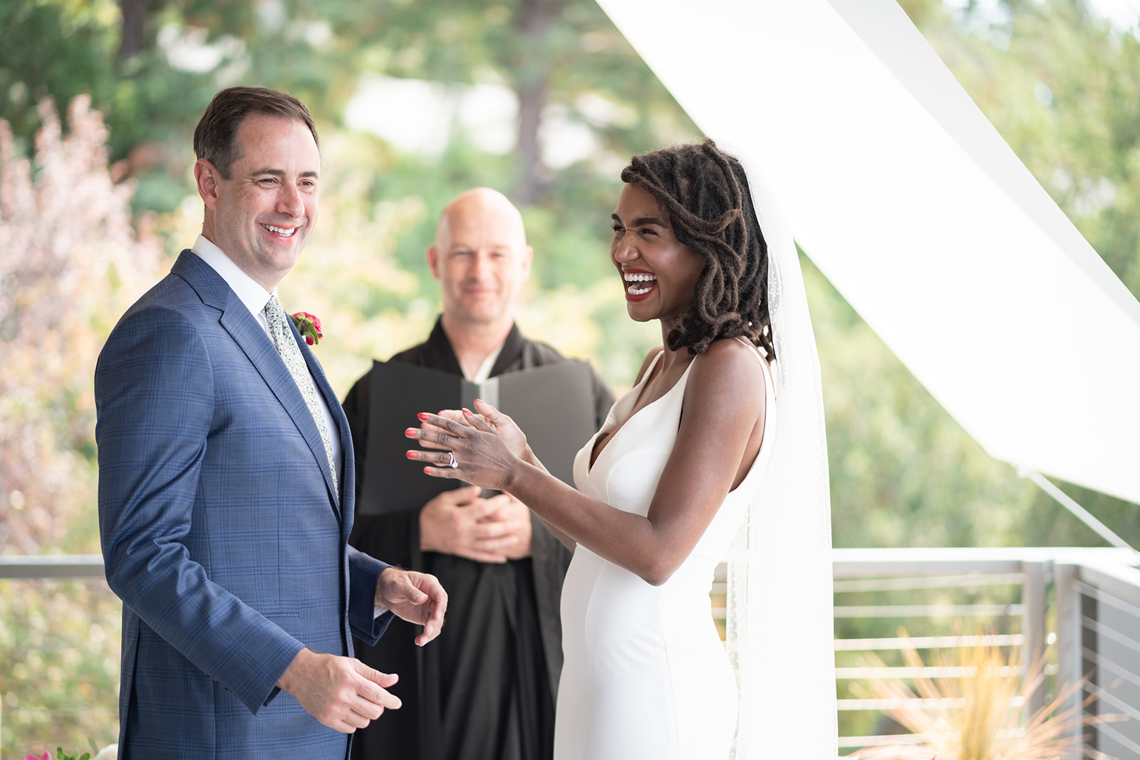 Joyful ceremony moment at OLW wedding